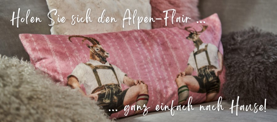 Einrichten im Alpenstil mit besonderen Decken und Kissen